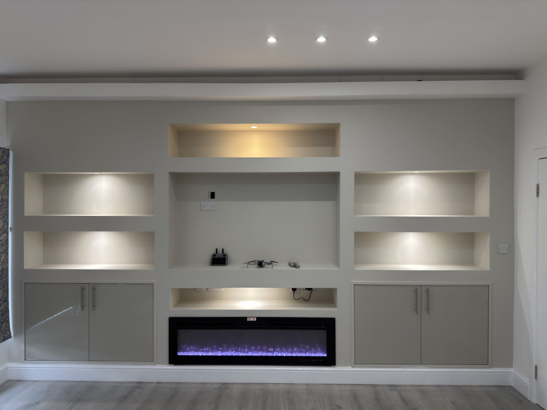 Residential redevelopment media lounge by Redwood Construction Group