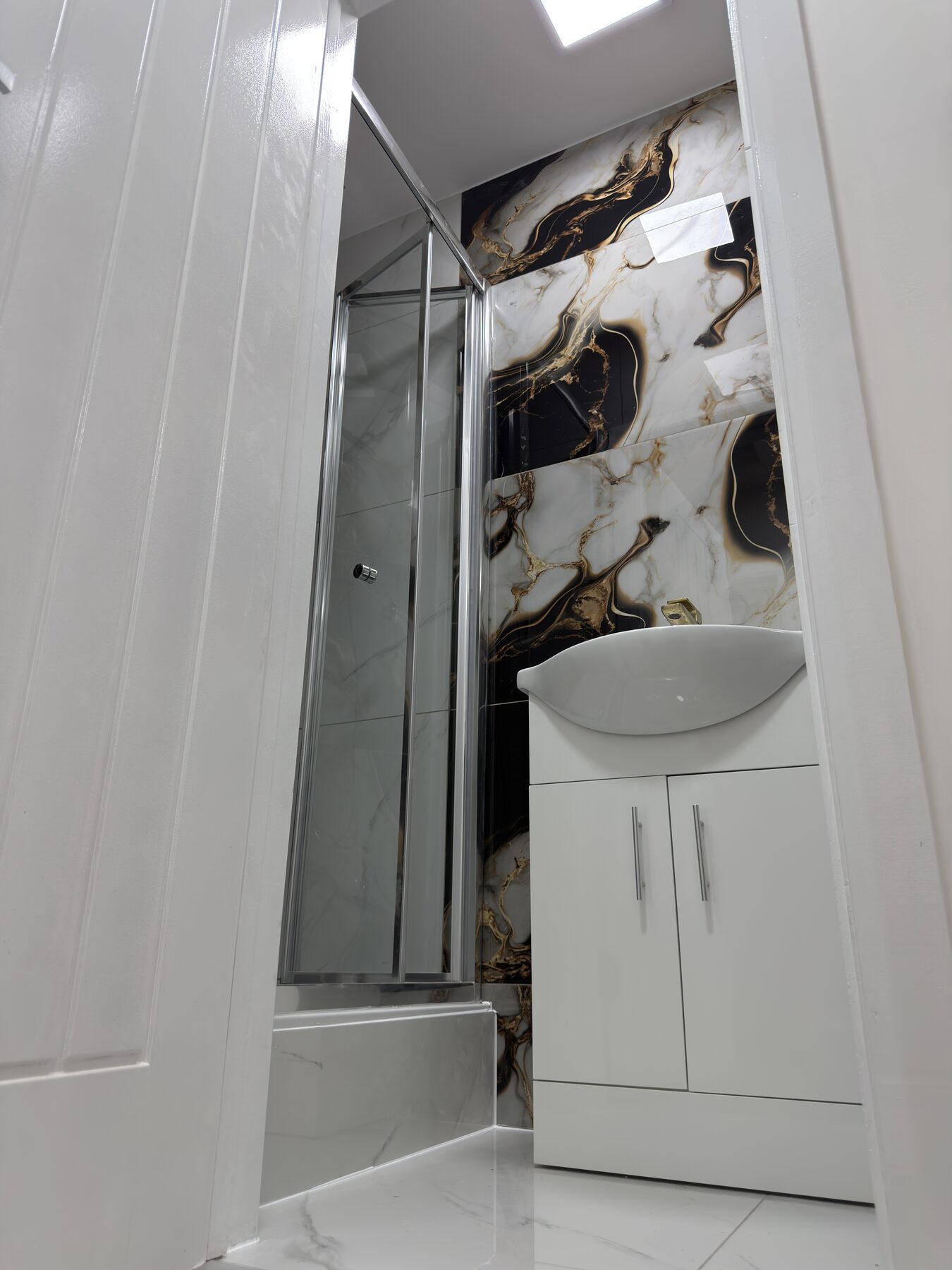E11 bathroom top detail and polished finish